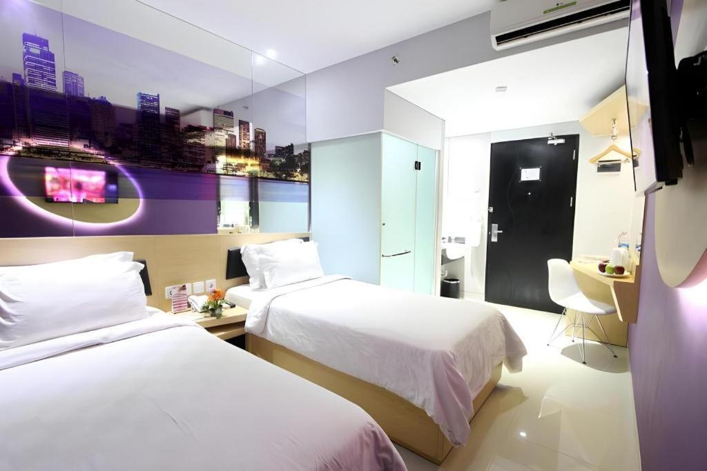 จี สวีท โฮเทล บาย อมิทยา Hotel สุราบายา ภายนอก รูปภาพ